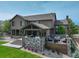 View of the home's beautiful backyard and amazing outdoor living space at 6078 Bridle Path Ln, Parker, CO 80134