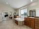 Luxurious primary bathroom with dual vanities, a soaking tub, large windows, and separate shower at 6078 Bridle Path Ln, Parker, CO 80134