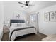 Inviting bedroom with neutral walls, ceiling fan, and a window with natural light at 9719 Albion Ln, Thornton, CO 80229