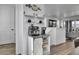 Charming coffee bar featuring modern espresso machine and stylish mug display at 8728 Hotchkiss St, Littleton, CO 80125