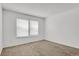 Bedroom featuring carpet flooring and a window at 3300 W Florida Ave # 26, Denver, CO 80219
