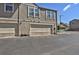 Garage with tan siding at 3300 W Florida Ave # 26, Denver, CO 80219