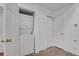 Efficient laundry area with a stackable washer and dryer and extra storage space at 3300 W Florida Ave # 26, Denver, CO 80219