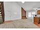 Inviting living room with vaulted ceilings, brick fireplace, and abundant natural light at 3300 W Florida Ave # 26, Denver, CO 80219