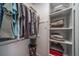 A closet with shelving and hanging storage, providing ample space for clothes and accessories at 7515 Pineridge Trl, Castle Pines, CO 80108