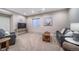 Basement living area with cozy seating, TV, large window, and plush carpeting at 7515 Pineridge Trl, Castle Pines, CO 80108