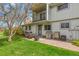 Inviting backyard featuring a patio with an outdoor dining and grill area at 387 Upham St, Lakewood, CO 80226