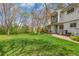 Lush backyard with a patio and BBQ area, ideal for outdoor living at 387 Upham St, Lakewood, CO 80226