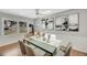 Dining room with modern decor, a wood-burning stove, and natural light at 258 Post Boy Rd, Boulder, CO 80302