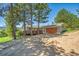 Charming single Gathering home with well-maintained landscaping and an attached garage at 258 Post Boy Rd, Boulder, CO 80302