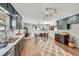 Open kitchen/dining area featuring ample counter space and eat-in dining area at 258 Post Boy Rd, Boulder, CO 80302