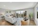 Bright living room featuring hardwood floors, mountain views, and neutral furnishings at 258 Post Boy Rd, Boulder, CO 80302