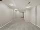 Spacious finished basement featuring neutral walls, carpet, and recessed lighting for versatile living possibilities at 4111 W Kenyon Ave, Denver, CO 80236