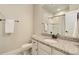 Bathroom with a granite vanity and tiled shower at 7099 E 123Rd Pl, Thornton, CO 80602