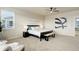 Bedroom with natural light, neutral decor, and stylish furnishings at 7099 E 123Rd Pl, Thornton, CO 80602