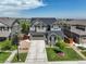 Beautiful two-story home with a well-manicured lawn and charming curb appeal at 7099 E 123Rd Pl, Thornton, CO 80602