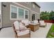 Cozy patio featuring comfortable seating and a fire pit, great for relaxing outdoors at 7099 E 123Rd Pl, Thornton, CO 80602