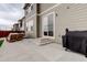 Spacious patio with convenient access to the house, ideal for outdoor gatherings at 7099 E 123Rd Pl, Thornton, CO 80602