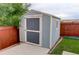 Well-maintained shed in the backyard, offering additional storage space at 7099 E 123Rd Pl, Thornton, CO 80602