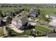 Aerial view of the property showcasing its prime location within a well-manicured neighborhood with views of the community golf course at 27290 E Nova Cir, Aurora, CO 80016