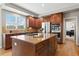 Kitchen with island, stainless steel appliances, granite countertops, and plenty of cabinetry at 27290 E Nova Cir, Aurora, CO 80016