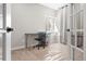 Well-lit office space featuring a desk, chair, storage, and a bright window creating an inviting workspace at 27290 E Nova Cir, Aurora, CO 80016
