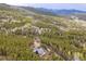 Secluded cabin nestled in a lush forest with stunning mountain views at 352 Apache Rd, Evergreen, CO 80439