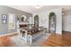 Inviting dining room with large table, fireplace and natural light at 11687 Decatur Dr, Westminster, CO 80234