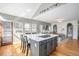 A cozy Gathering space for gathering featuring built-in shelving, hardwood floors, and lots of natural light at 11687 Decatur Dr, Westminster, CO 80234