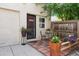 Charming front porch with brick pavers and potted plants at 1532 N High St # 1, Denver, CO 80218
