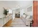 Bright living room with hardwood floors and a dining area at 1532 N High St # 1, Denver, CO 80218