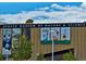Denver Museum of Nature & Science with colorful exhibits displayed on the building's exterior on a clear day at 1532 N High St # 1, Denver, CO 80218