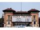 The historic Ogden Theatre featuring a classic marquee and brick facade, a popular entertainment venue at 1532 N High St # 1, Denver, CO 80218