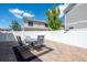 Cozy patio area with outdoor furniture and privacy fence at 5552 Odessa St, Denver, CO 80249
