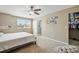 This bedroom has a window and also has access to a walk-in closet at 5552 Odessa St, Denver, CO 80249