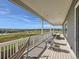 Comfortable back deck with seating area and open view of the neighborhood at 14440 Hop Clover Trl, Parker, CO 80134