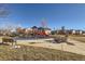 Community playground with playset and benches at 10699 Durango Pl, Longmont, CO 80504