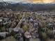 Aerial view of the property with mountain views, close to town, and surrounded by lush greenery at 218 Highland Ter, Breckenridge, CO 80424