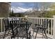 Outdoor seating area with stunning mountain views from private balcony at 218 Highland Ter, Breckenridge, CO 80424