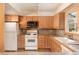 Cozy kitchen features stainless steel microwave and white appliances at 218 Highland Ter, Breckenridge, CO 80424