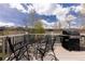 Outdoor patio space with seating, grill and beautiful views of mountains at 218 Highland Ter, Breckenridge, CO 80424
