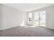 Bright, comfortable bedroom featuring neutral walls and plush carpeting at 9314 Biscay St, Commerce City, CO 80022