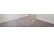 Neutral carpeting in the common area of a home at 9314 Biscay St, Commerce City, CO 80022