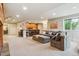 Finished basement featuring a wet bar, comfortable seating area, and plenty of space at 4651 Sonado Pl, Parker, CO 80134