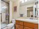 Modern bathroom with a glass-enclosed shower, vanity with sink, and contemporary fixtures at 4651 Sonado Pl, Parker, CO 80134