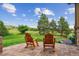 Relaxing patio area with comfortable seating and scenic views of the surrounding landscape at 4651 Sonado Pl, Parker, CO 80134