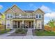 Charming townhome with a welcoming front porch and well-maintained landscaping at 17692 Olive St, Broomfield, CO 80023