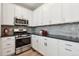 Well-appointed kitchen with stainless steel appliances and sleek countertops at 17692 Olive St, Broomfield, CO 80023
