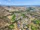 Aerial view of luxury homes and golf course community at 8002 Galileo Way, Littleton, CO 80125