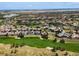 Aerial view of luxury homes and golf course community at 8002 Galileo Way, Littleton, CO 80125